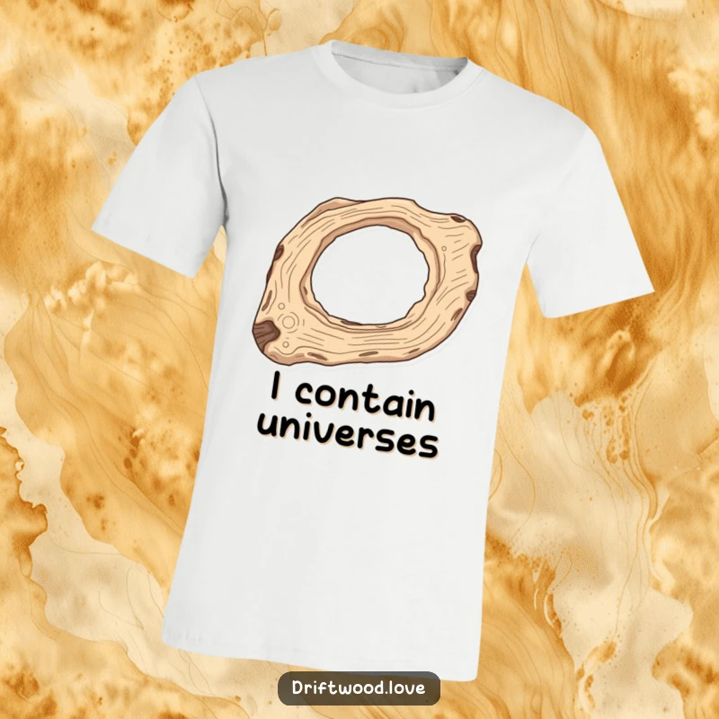 Funny Space Art T-Shirt with an elongated driftwood piece featuring carved-out negative space like a celestial body, promoting cosmic curiosity.